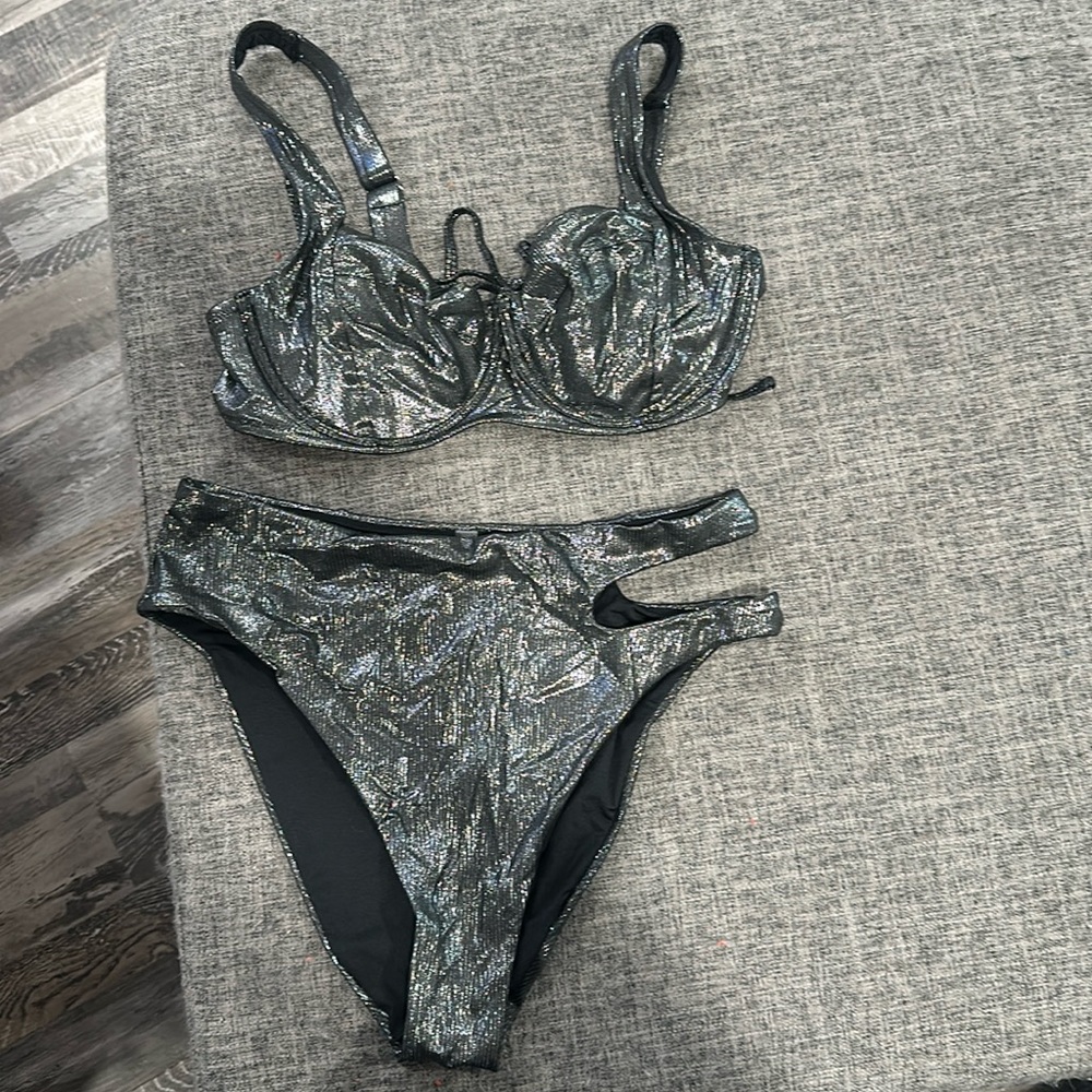 Never worn Victoria’s Secret swim suit. 2 different bottoms